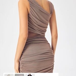 Mesh asymmetrical dress. NWT.